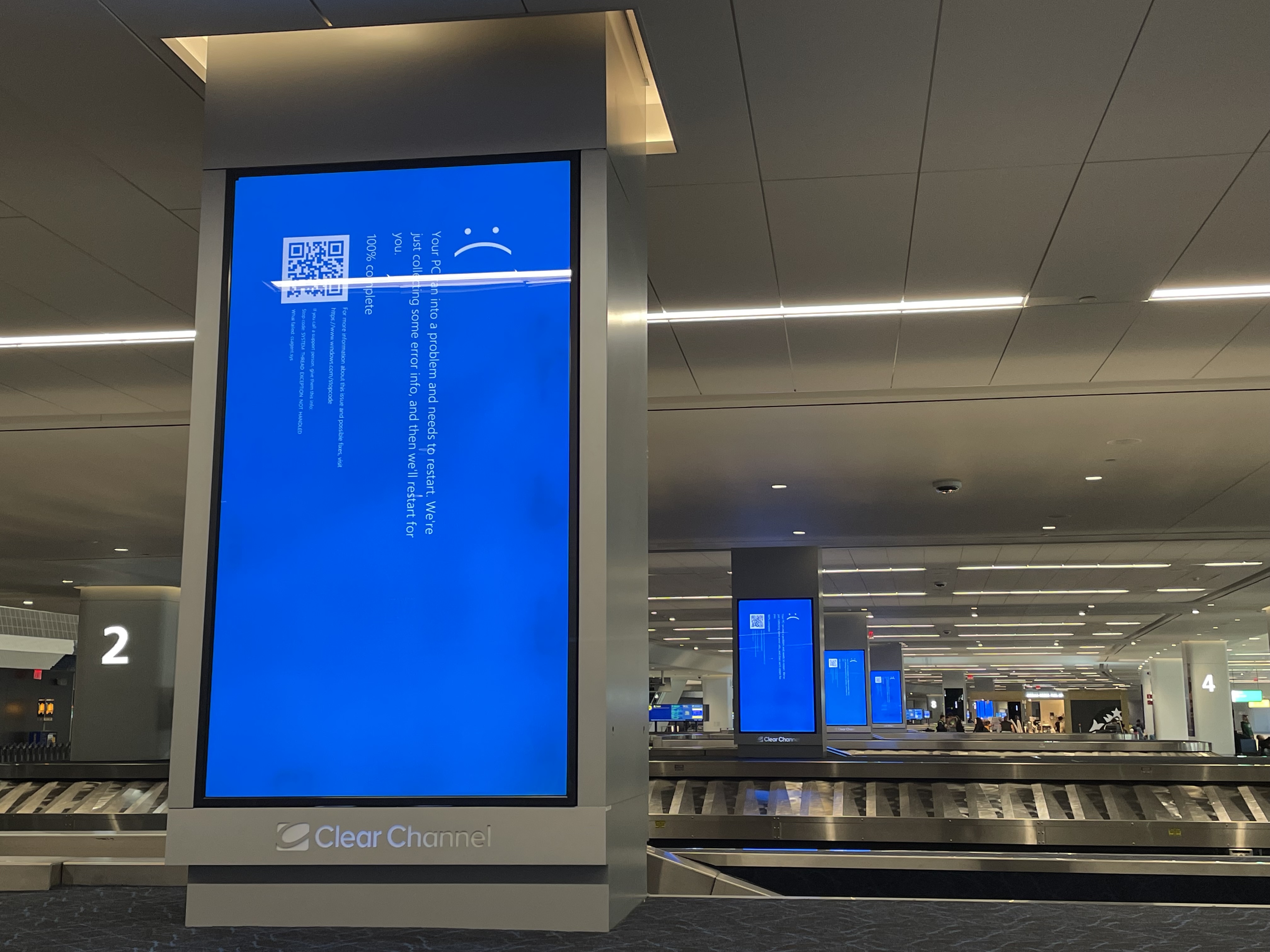 Blue screens across the monitors at LaGuardia Airport during the outage